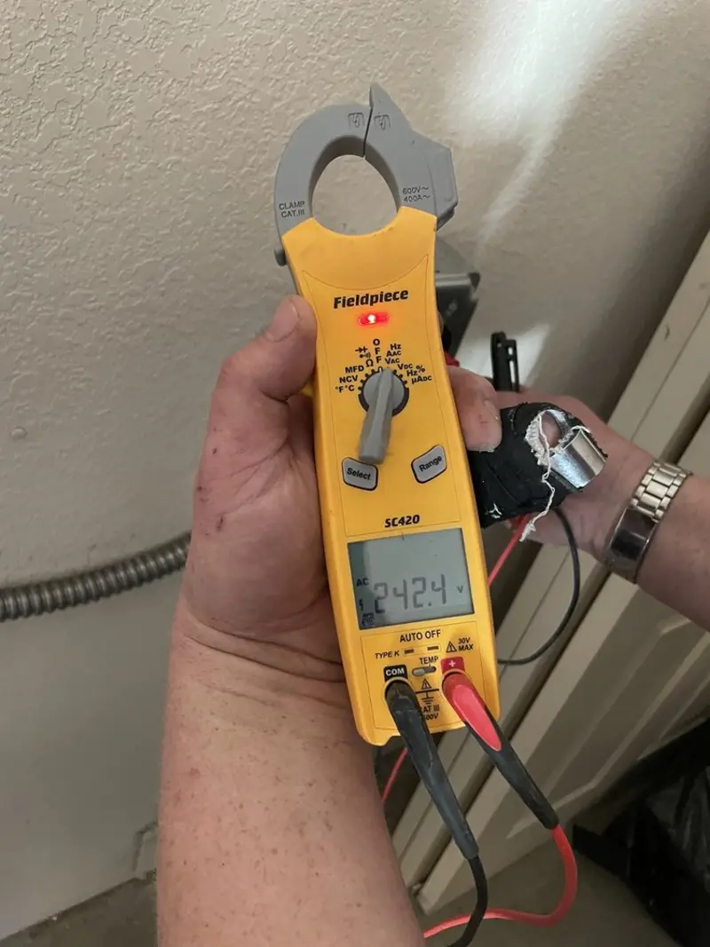 Voltage testing with clamp meter during Hot Tub / Pool Electrical Wiring in Nashua